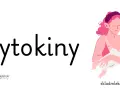 Ilustracja przedstawia słowo "Cytokiny" i kobietę karmiącą dziecko piersią.